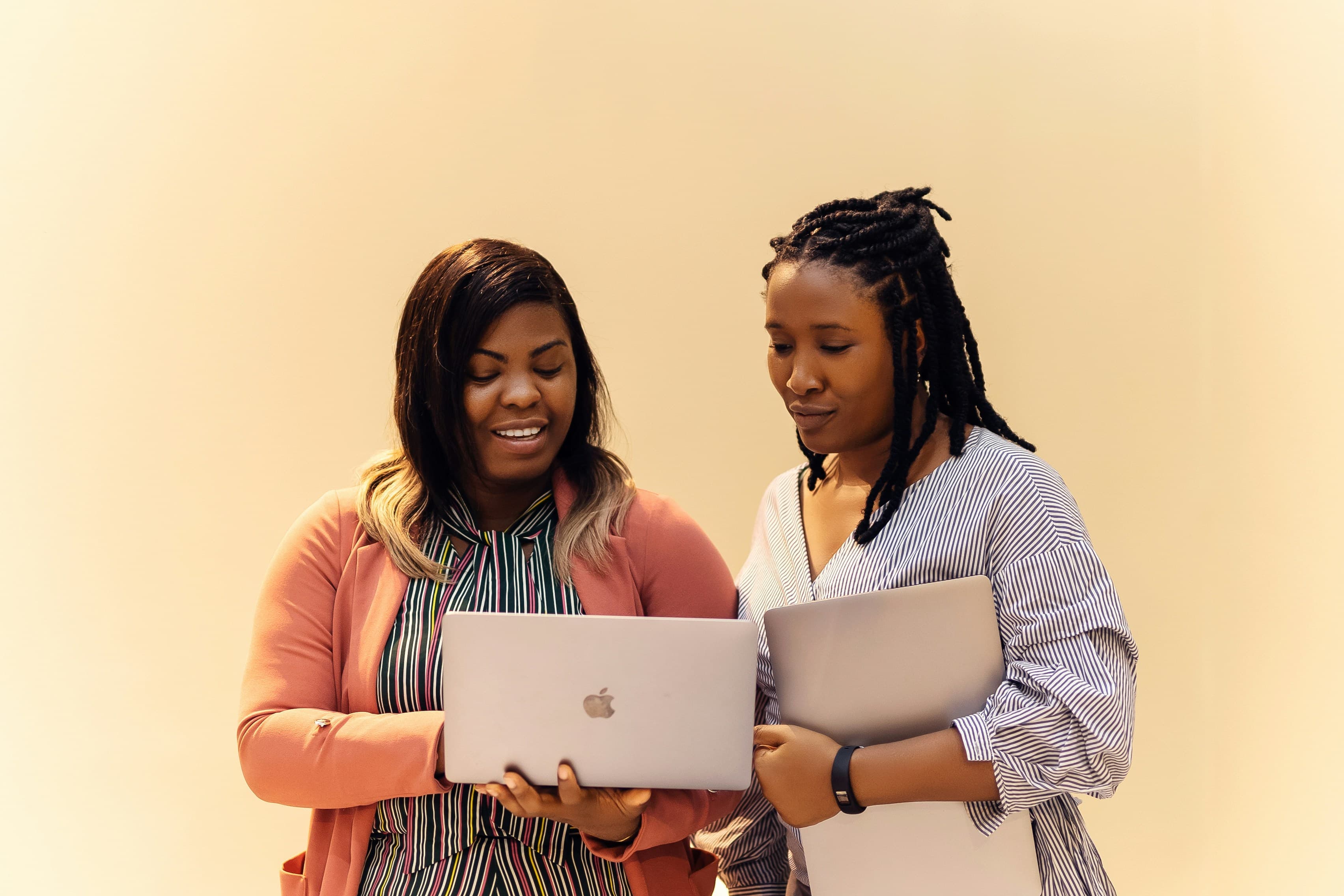 Two Ladies Looking at a laptop