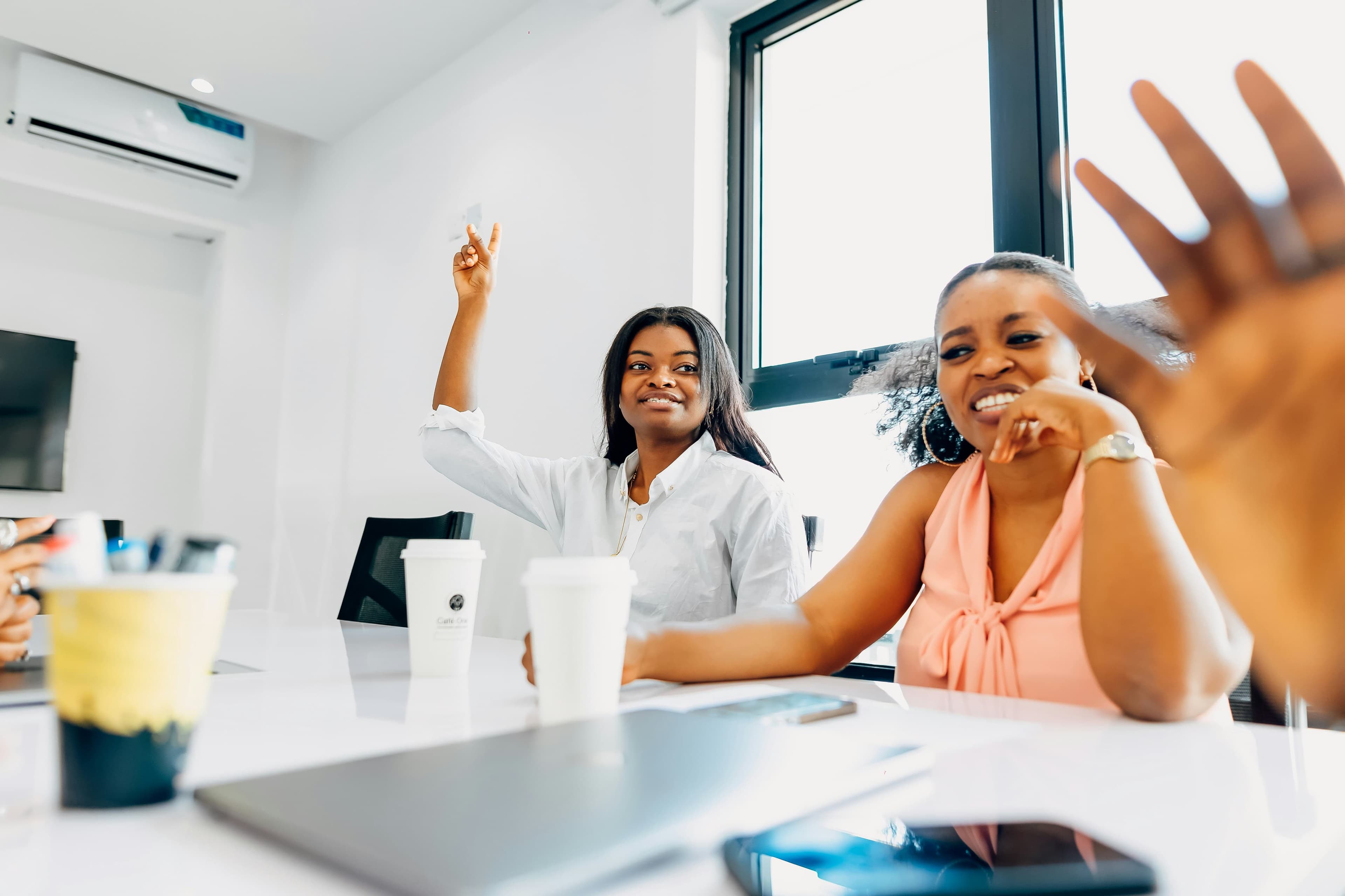 Two Ladies in a board meeting